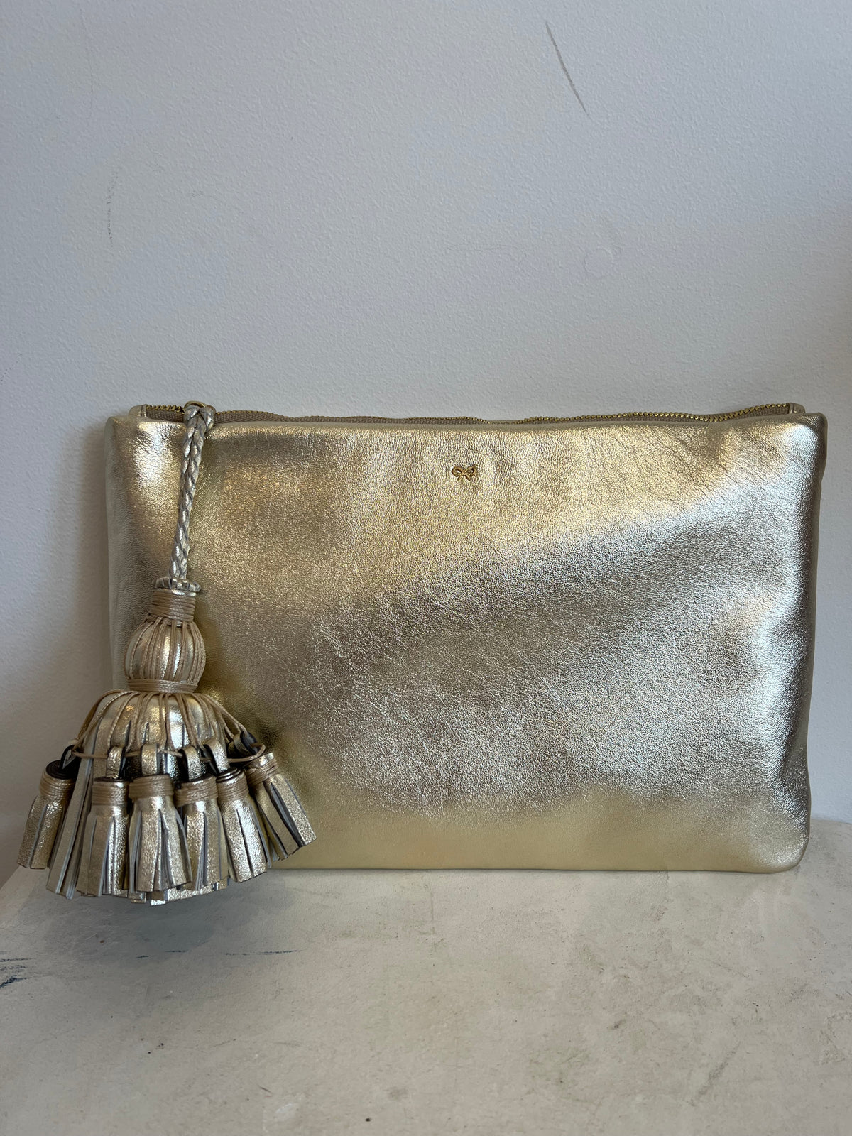 Anya Hindmarch Gold Padded Tassel Clutch