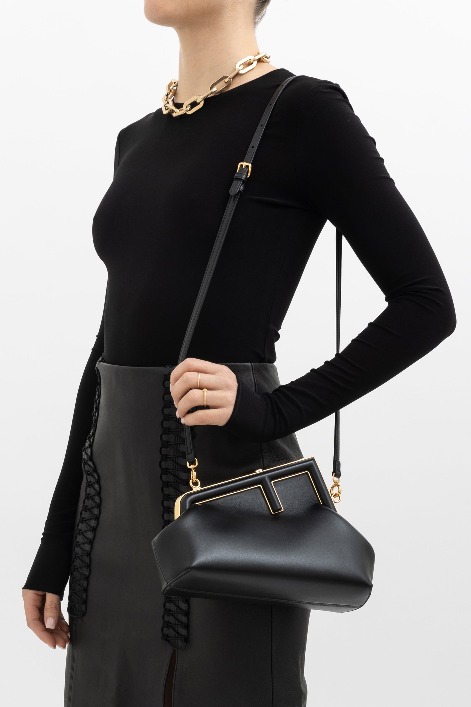 fendi-black-fendi-first-with-gold-hardware-873a