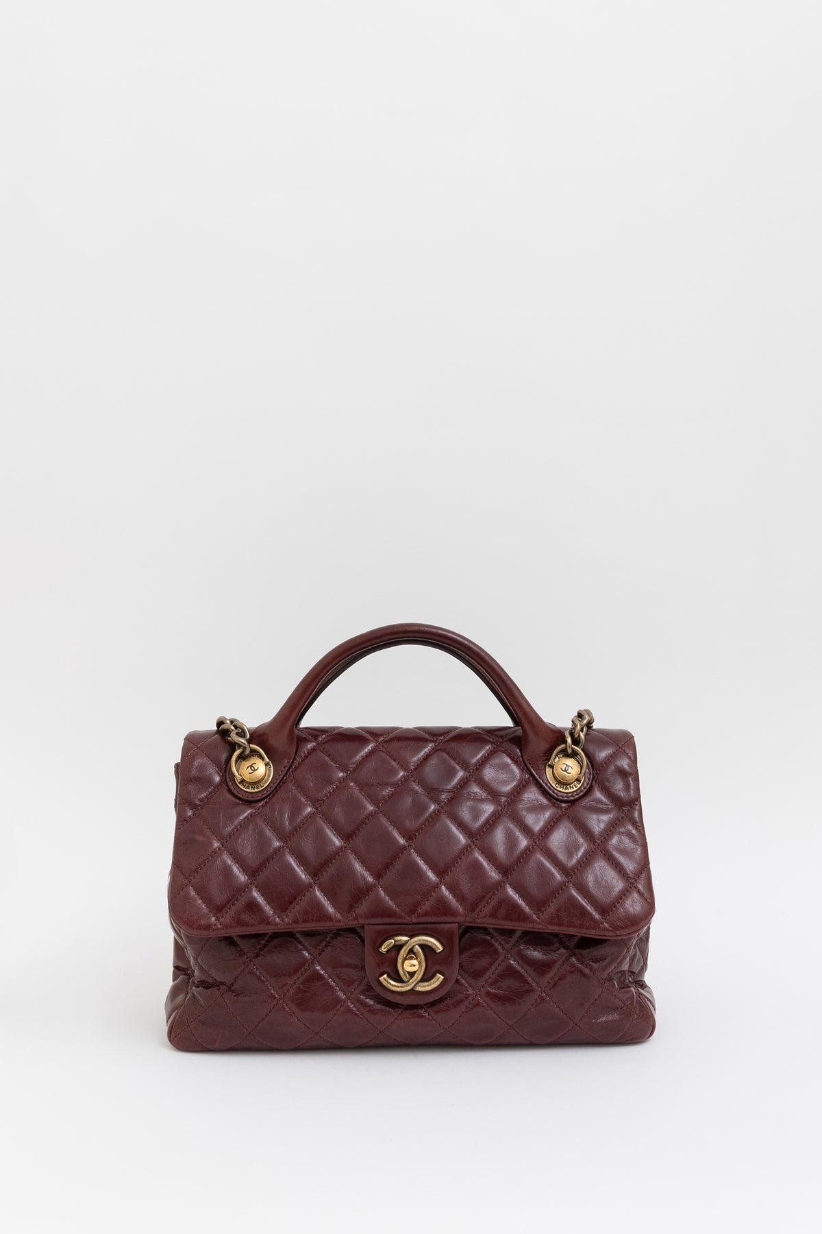 Quilted Castle Rock Top Handle Flap Bag