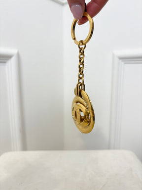 Chanel Gold Tone Spiral Logo Keyring