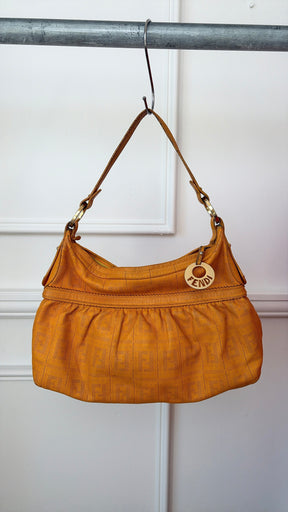 Fendi Orange Perforated Monogram Chef Bag