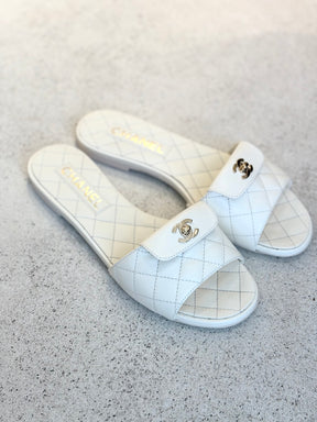 Chanel White Quilted Leather Turnlock Slides, 37.5