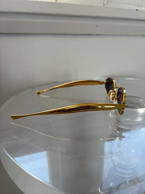 Bottega Veneta Gold Oval Sardine Sunglasses