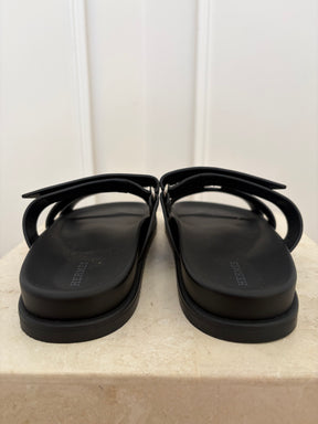 Hermès Black Leather Chypre Sandals, 38.5