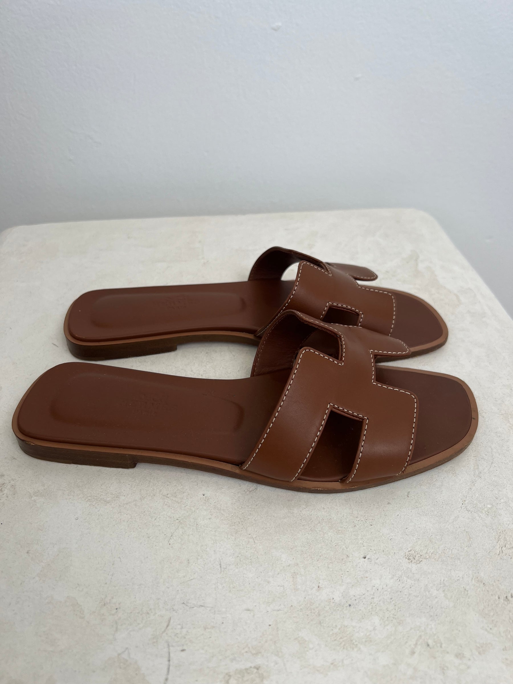 Hermès Gold Leather Oran Sandals, 36