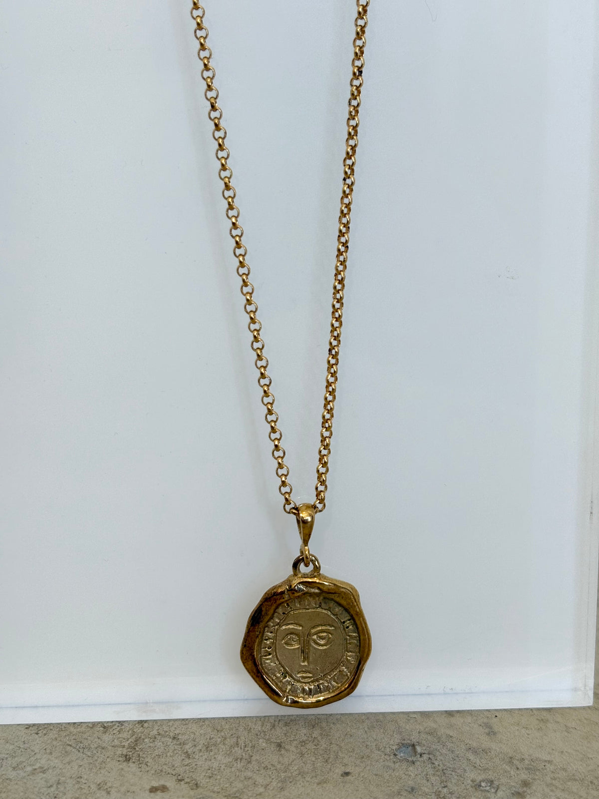 Holly Ryan Gold Tone Face Pendant Necklace
