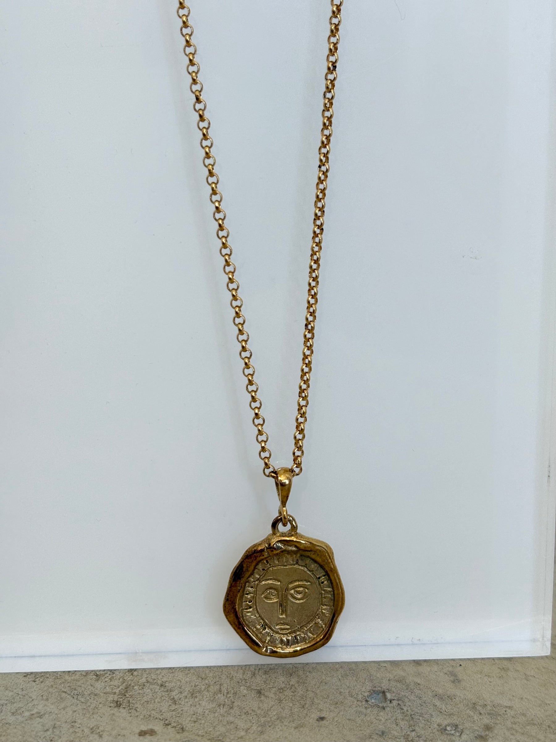 Holly Ryan Gold Tone Face Pendant Necklace