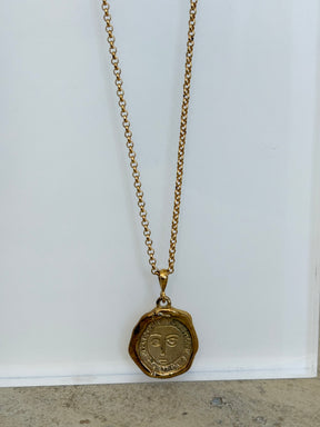 Holly Ryan Gold Tone Face Pendant Necklace