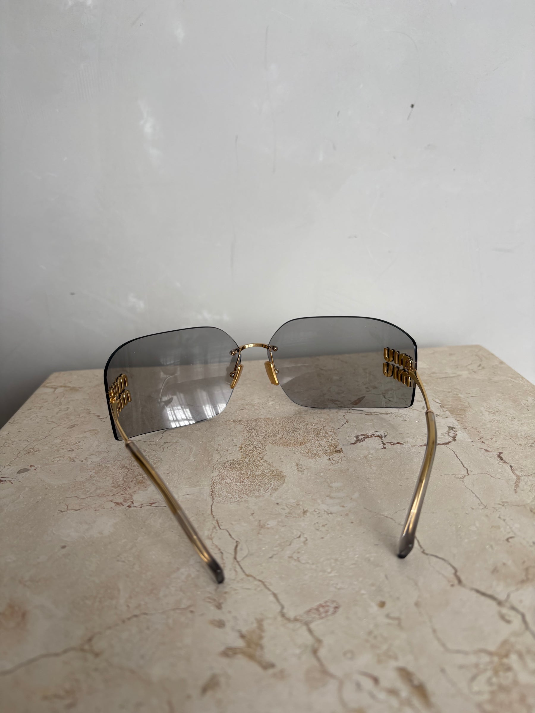 Miu Miu Grey and Gold Wrap Around Logo Sunglasses