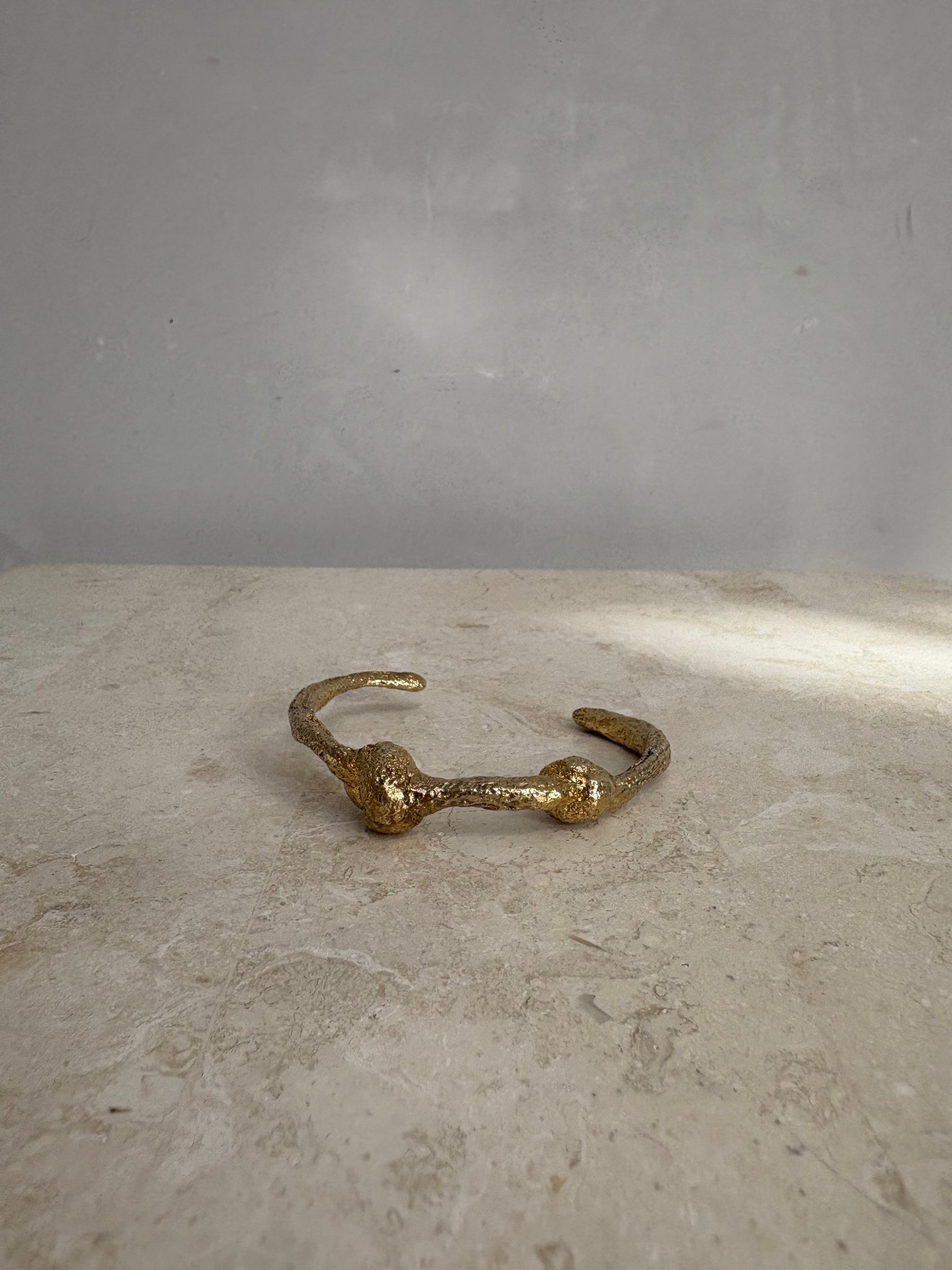 Lucy Folk Dough Knot Cuff In Yellow Gold