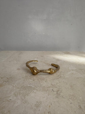 Lucy Folk Dough Knot Cuff In Yellow Gold