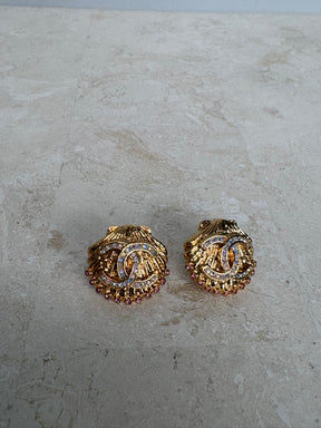 Chanel Gold Tone Crystal Logo Shell Earrings