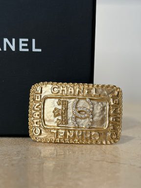 Chanel Gold Tone Logo Rectangular Brooch