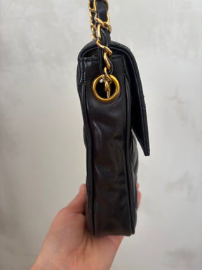 Chanel Black Lambskin Leather Vertical Mini Flap bag
