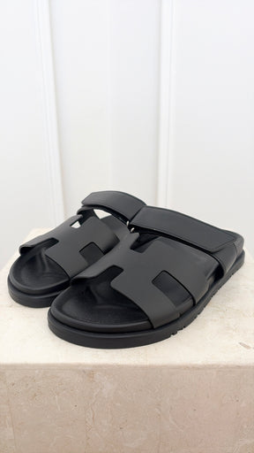 Hermès Black Leather Chypre Sandals, 38.5