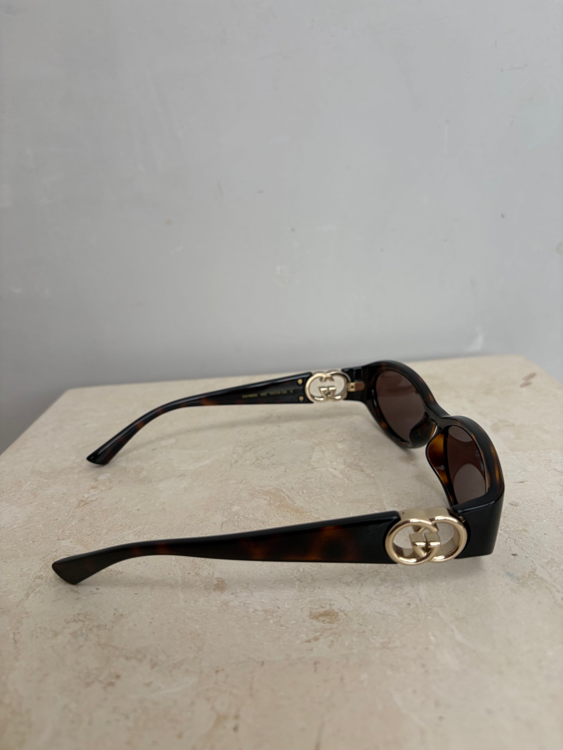 Gucci Tortoiseshell Oval Logo Arm Sunglasses