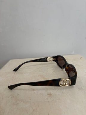 Gucci Tortoiseshell Oval Logo Arm Sunglasses