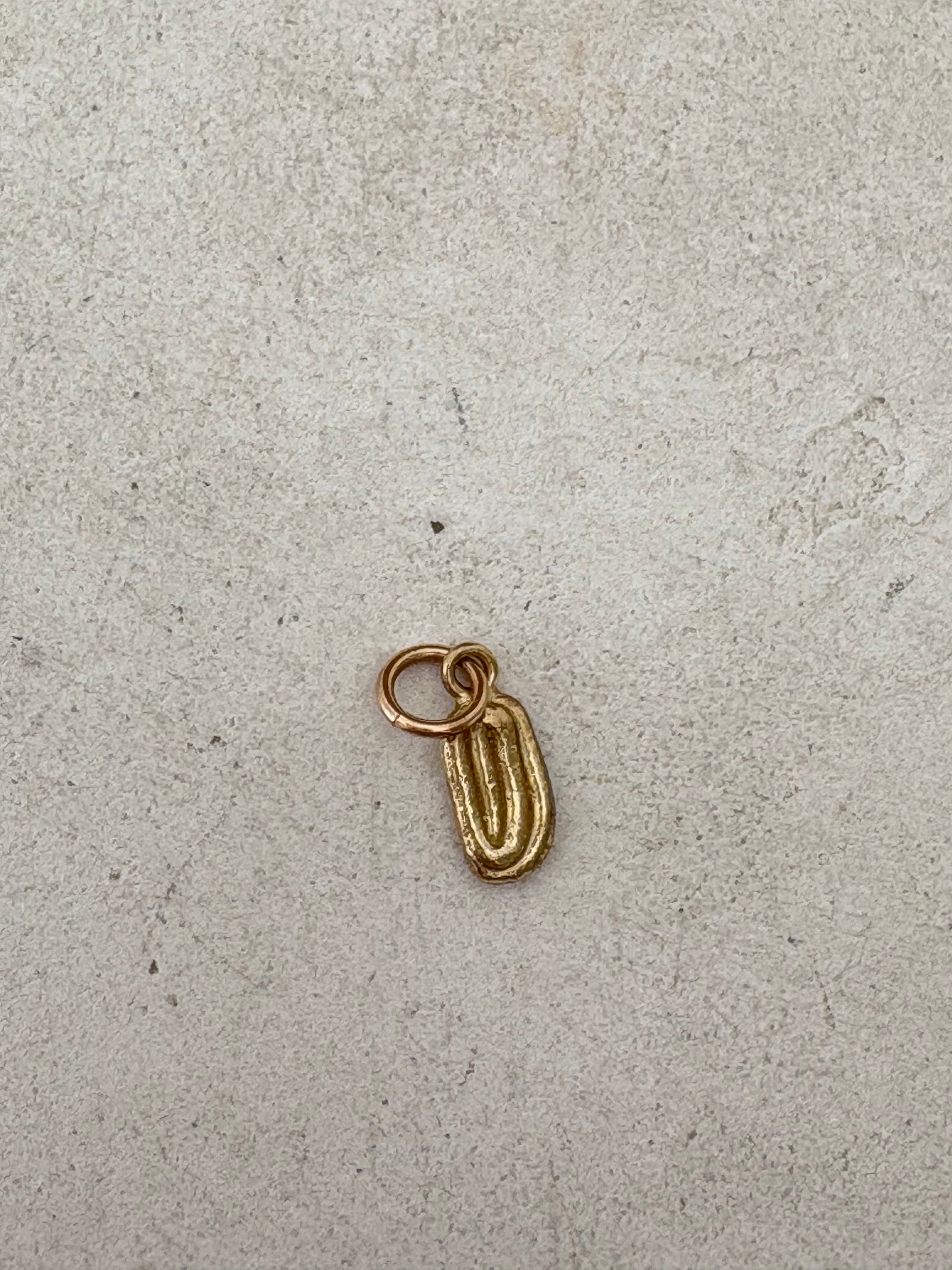 Lucy Folk 9k Gold Draa Charm