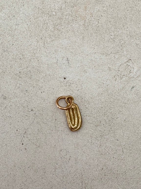 Lucy Folk 9k Gold Draa Charm