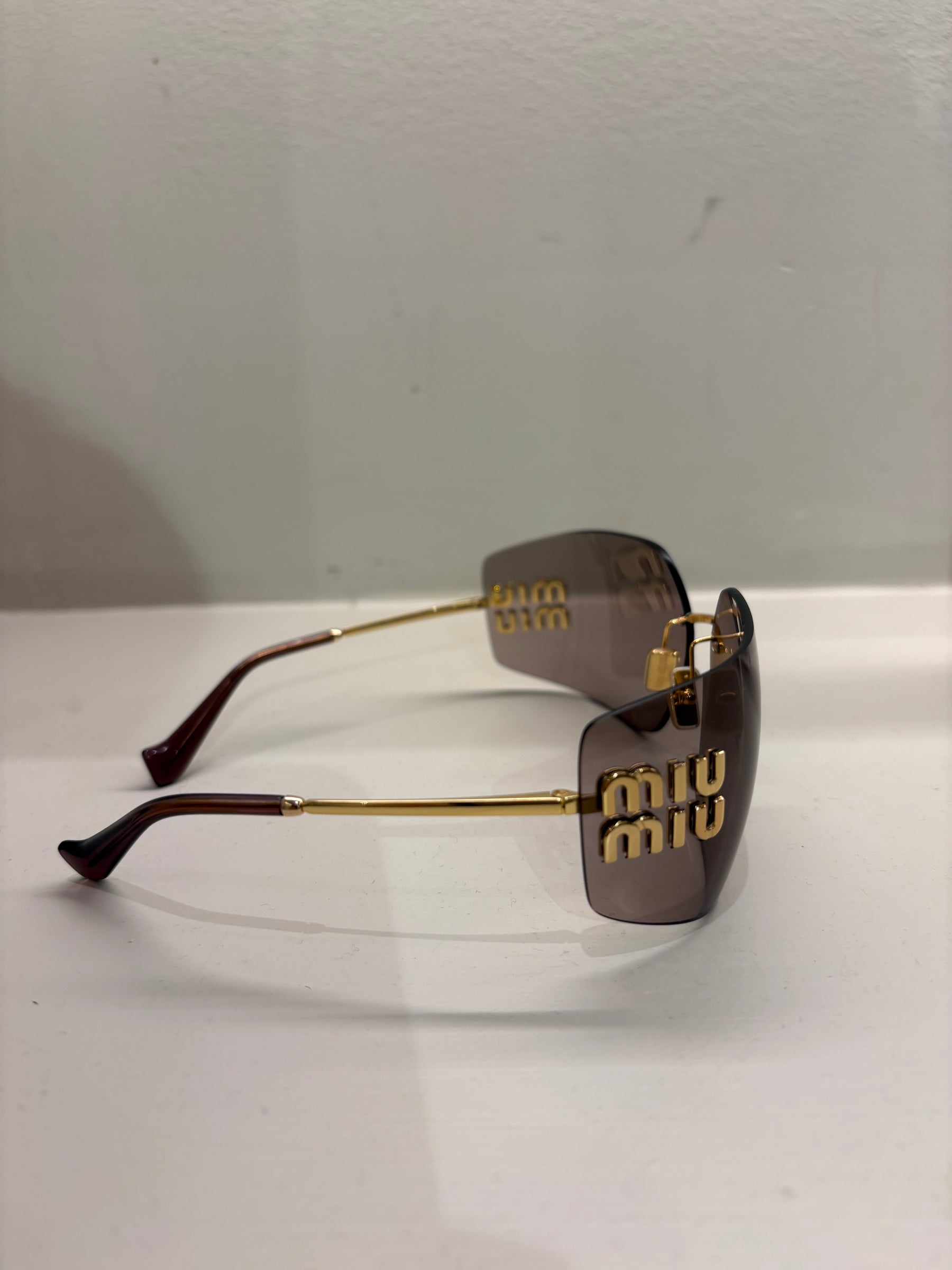 Miu Miu Wrap Around Sunglasses