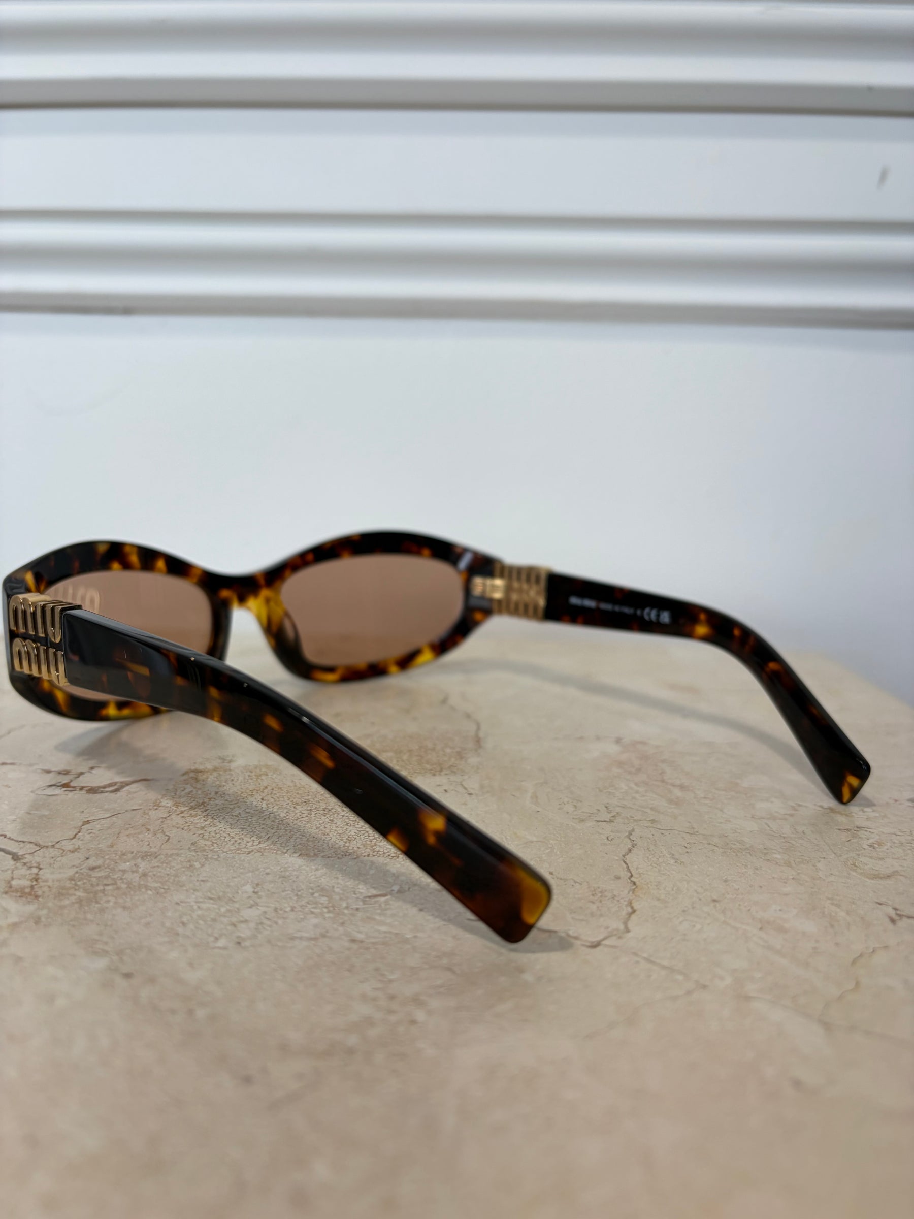 Miu Miu Tortoiseshell Oval Logo Sunglasses