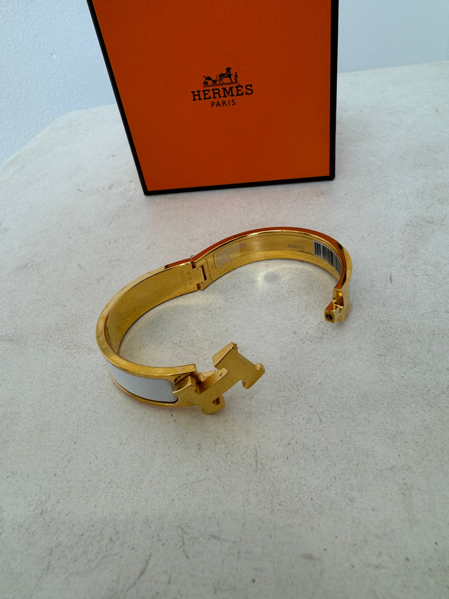 Hermès Gold Tone and White Enamel Clic H bangle