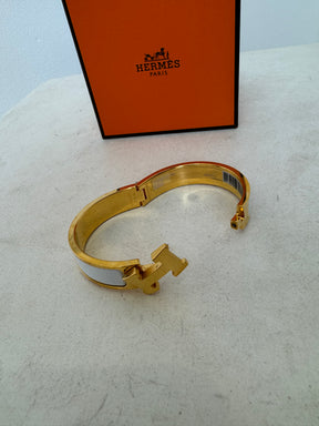 Hermès Gold Tone and White Enamel Clic H bangle