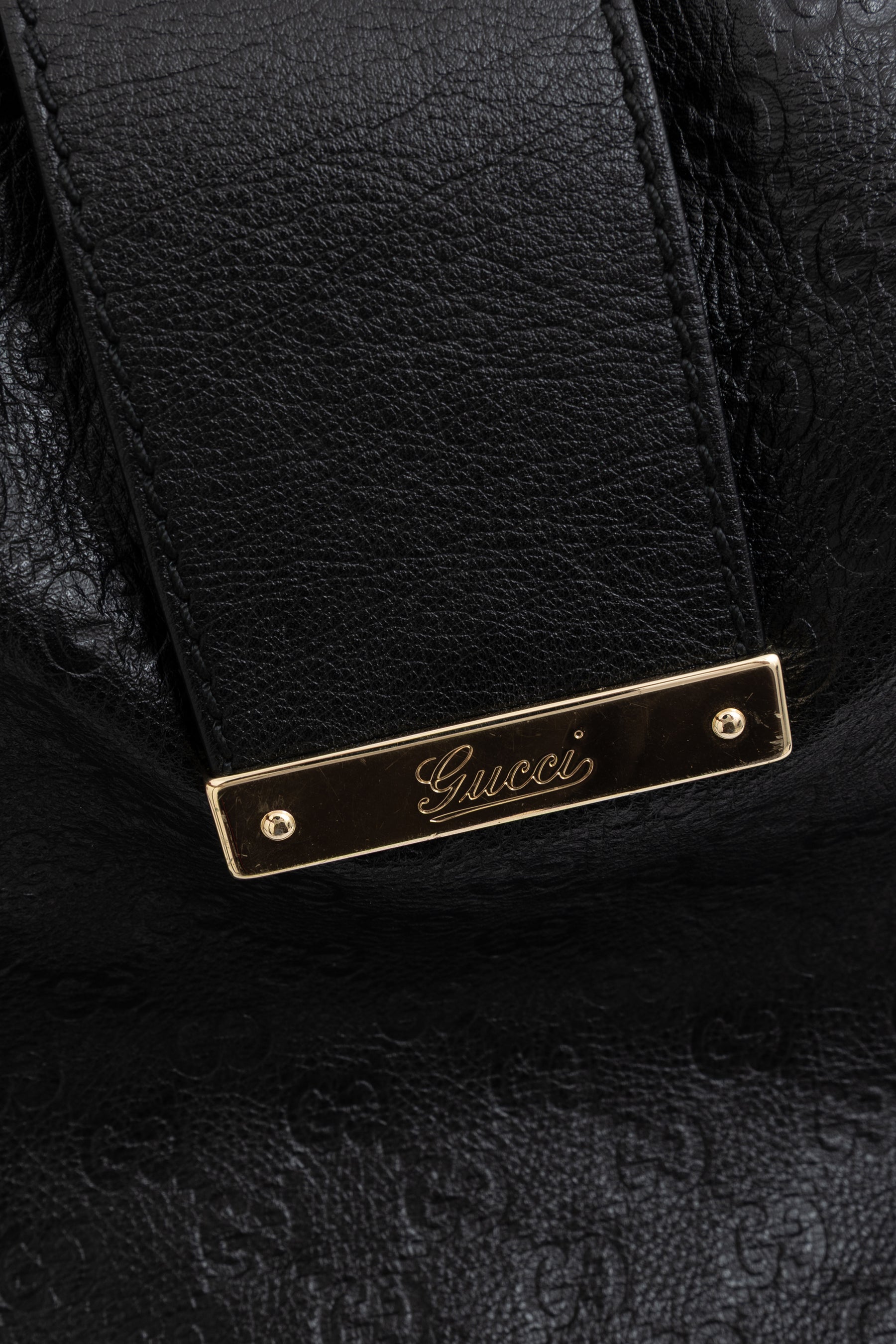 Embossed Monogram Hobo Bag
