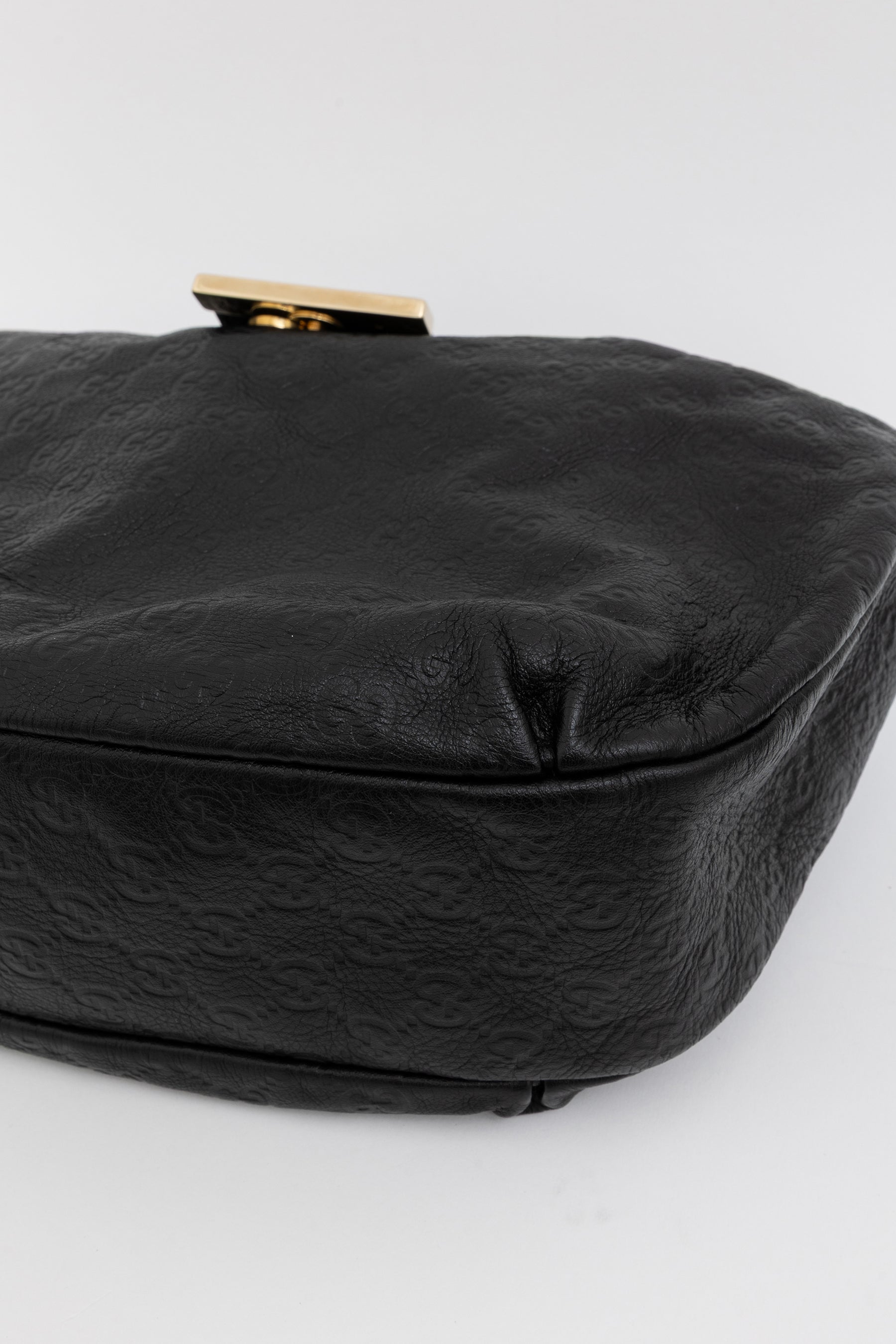 Embossed Monogram Hobo Bag