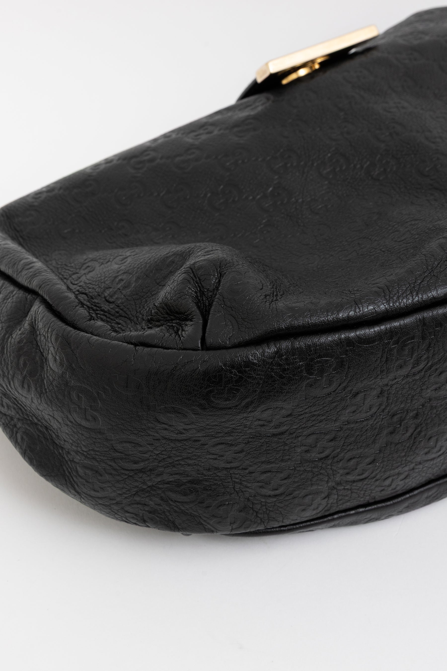 Embossed Monogram Hobo Bag