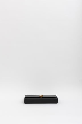 Monogram Kate Clutch