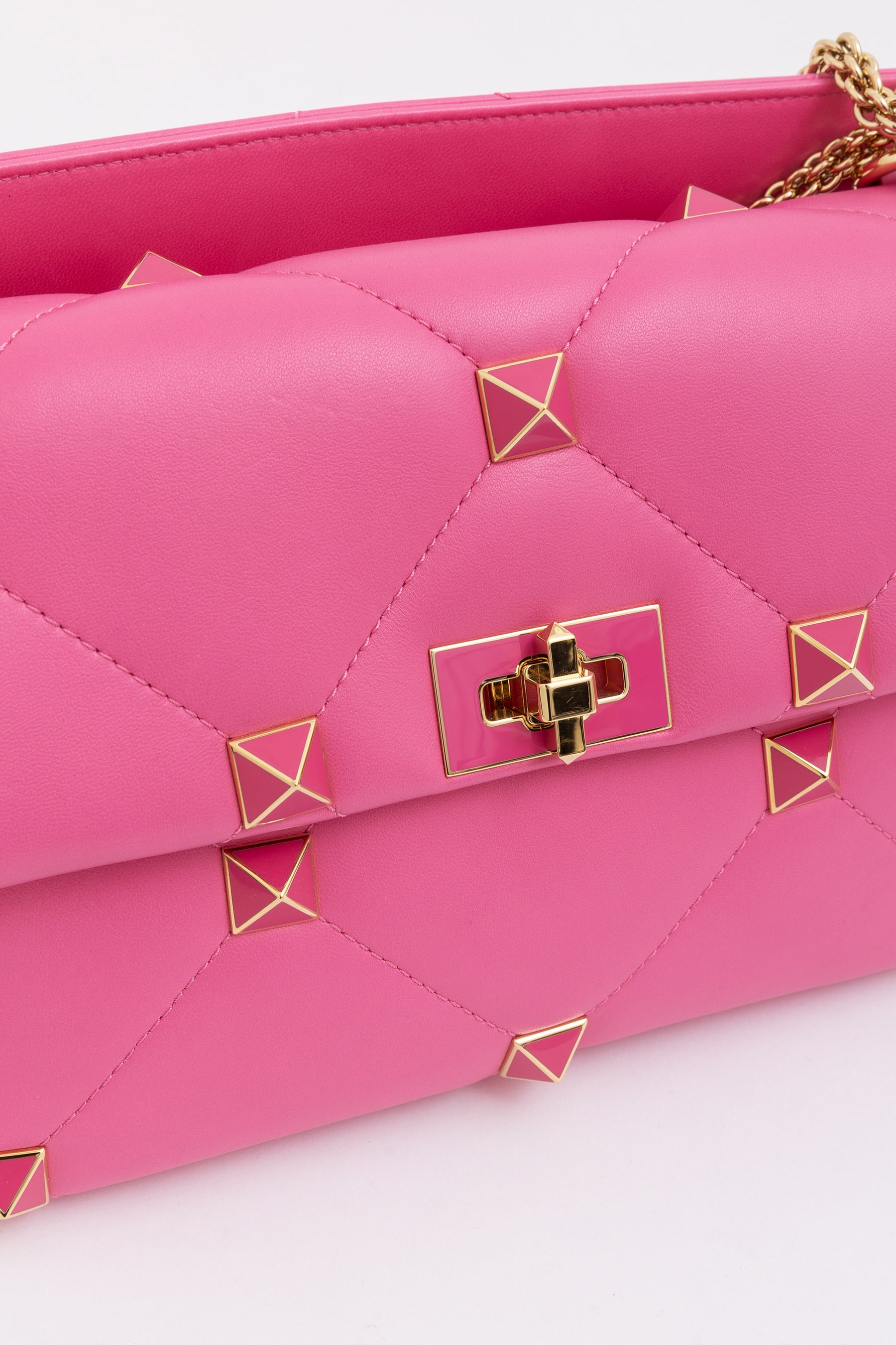 Roman Stud Quilted Shoulder Bag