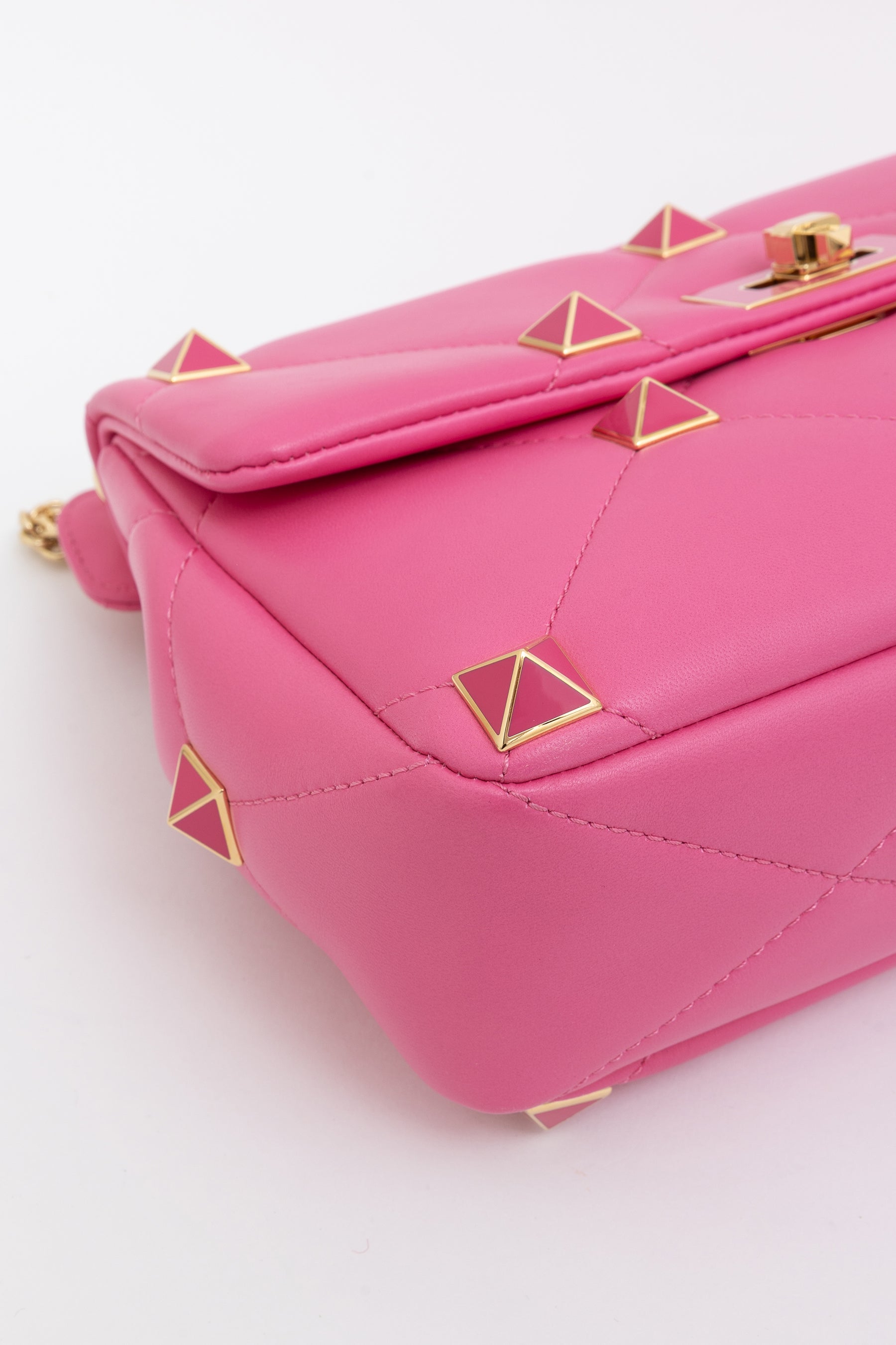 Roman Stud Quilted Shoulder Bag