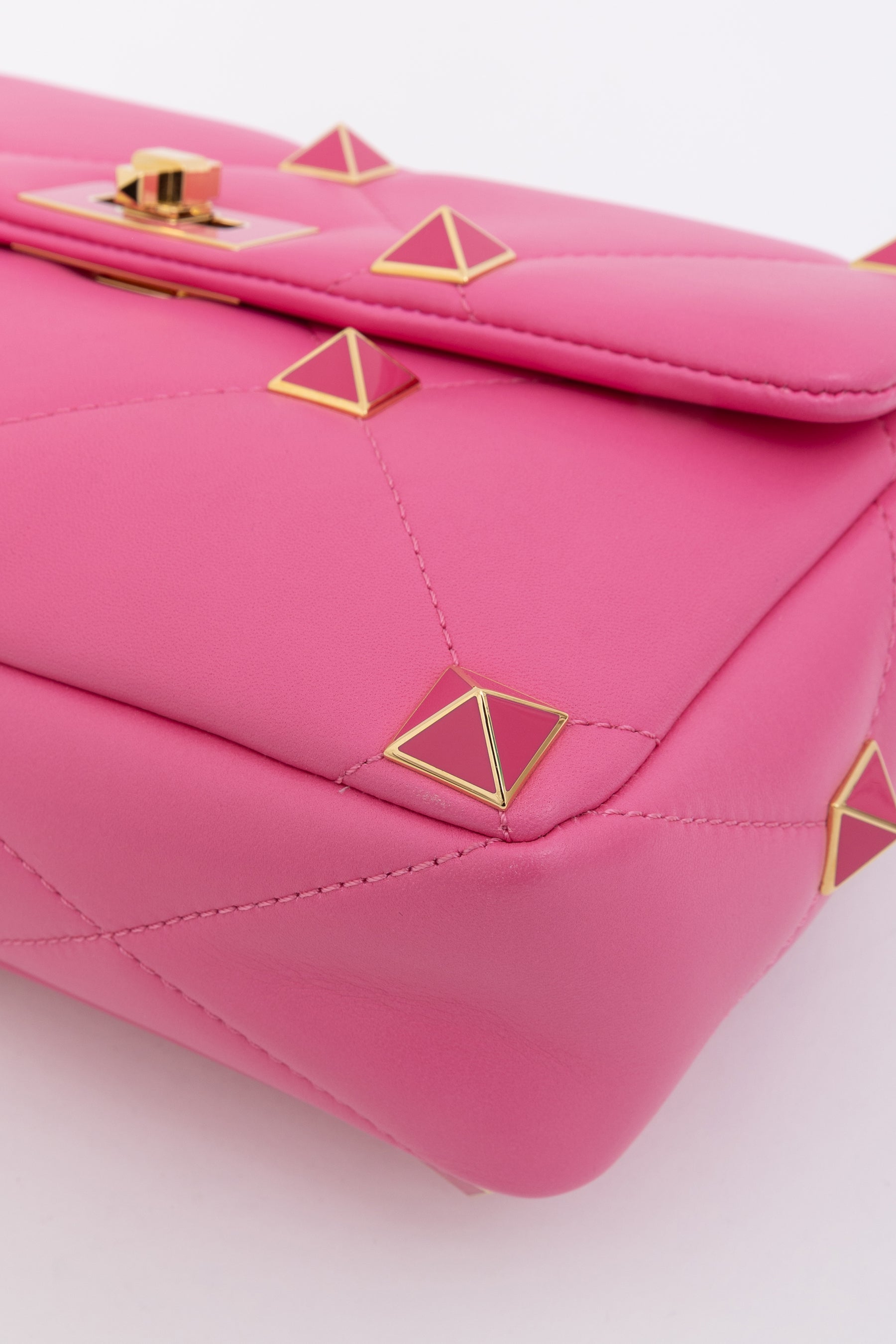 Roman Stud Quilted Shoulder Bag