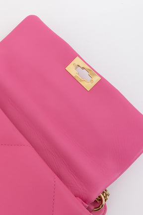 Roman Stud Quilted Shoulder Bag