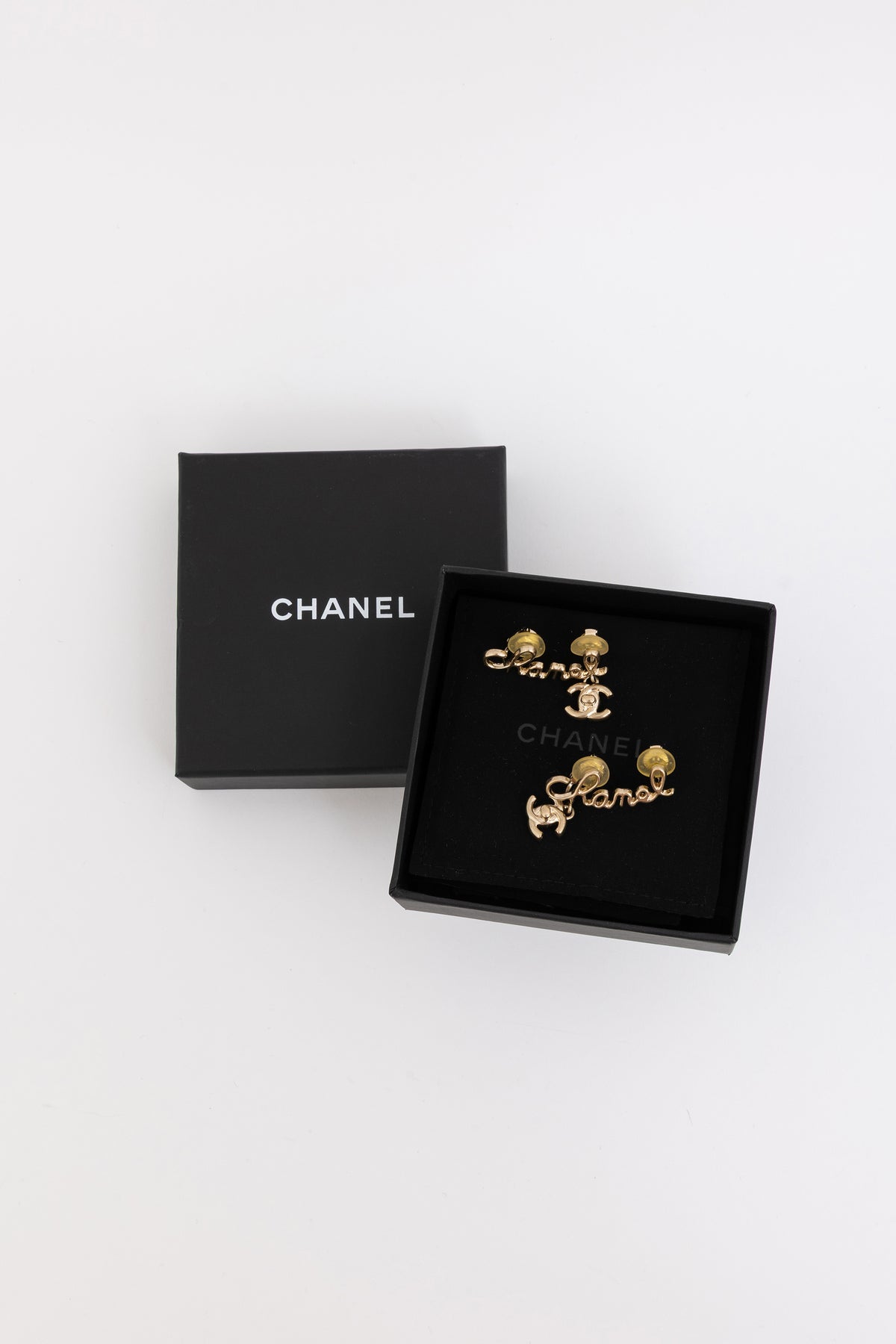 Signature and CC Logo Drop Clip-On Earrings