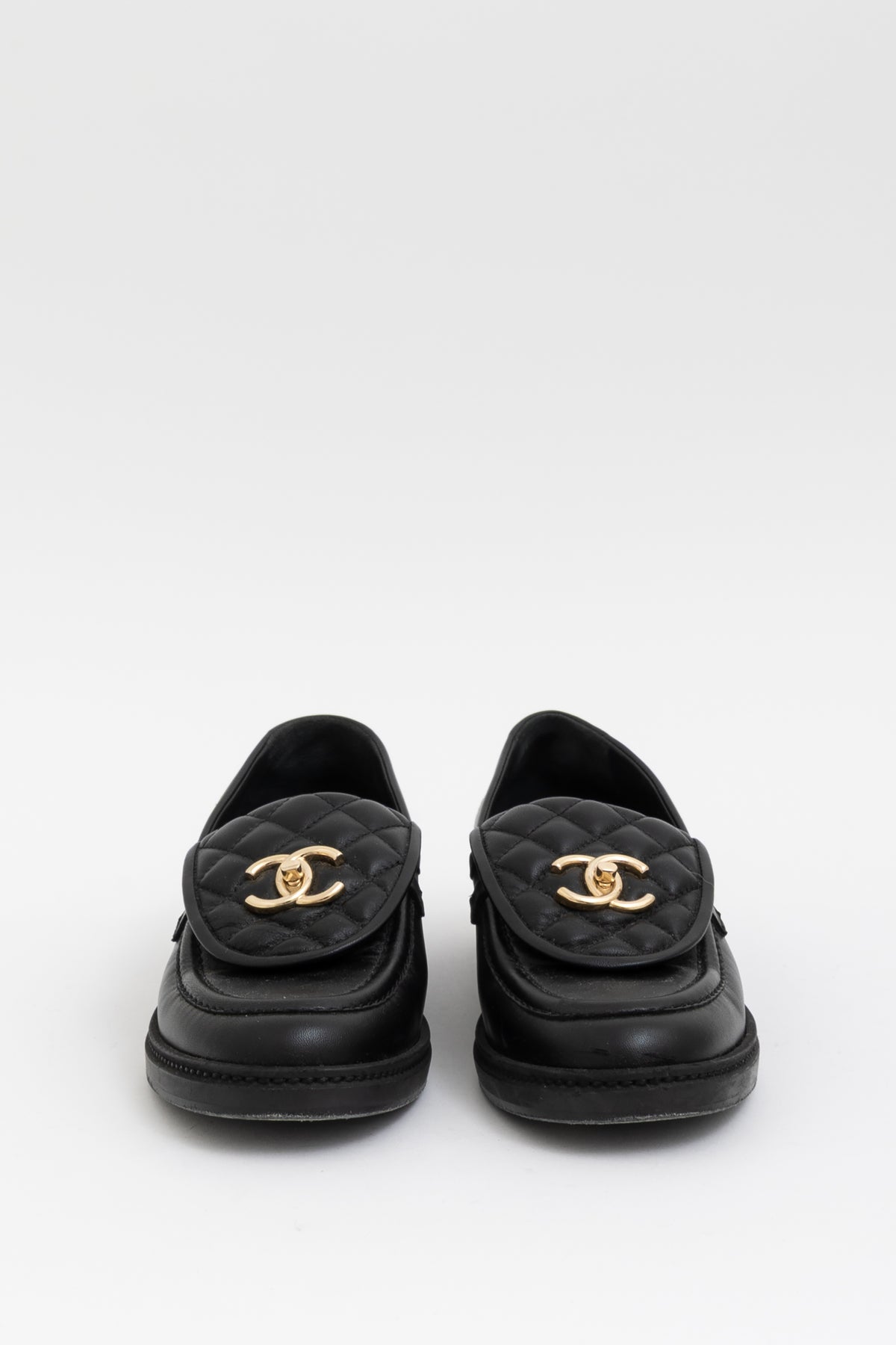 Quilted Turn Lock Loafers