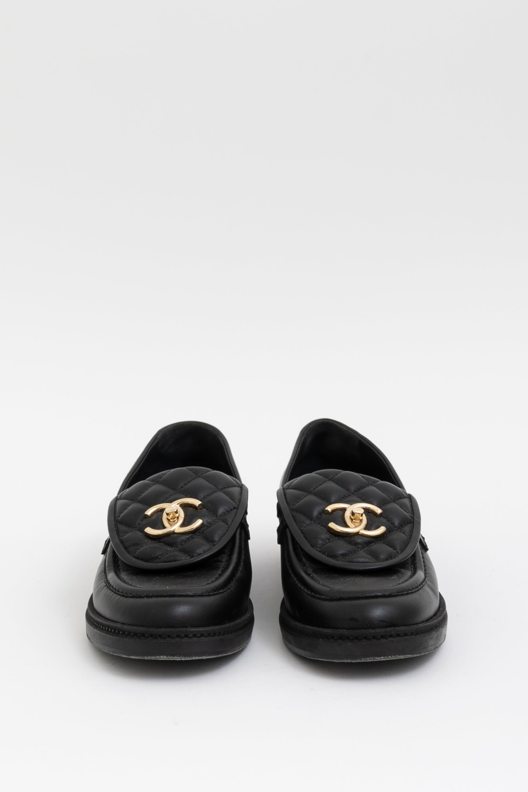 Quilted Turn Lock Loafers