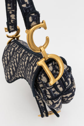 Oblique Monogram Saddle Bag