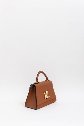 Twist One Handle PM Handbag