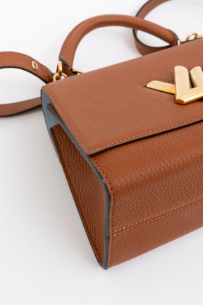 Twist One Handle PM Handbag