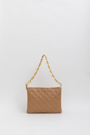 Coussin PM Handbag.