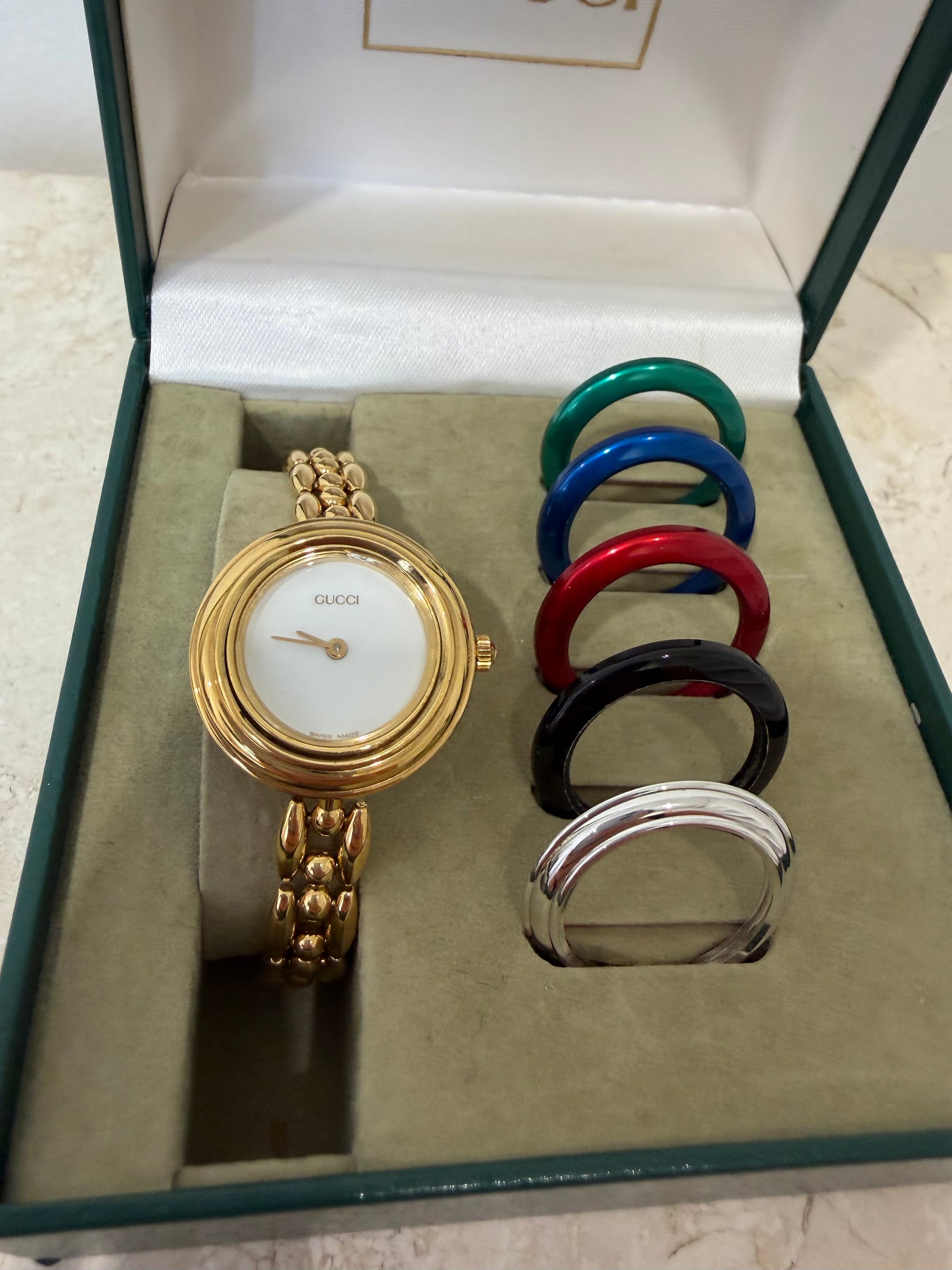 Gucci Gold Tone Interchangeable Bezel Watch
