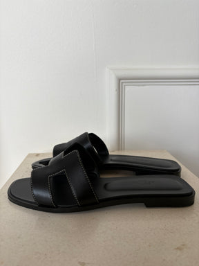 Hermès Black Leather Oran Sandals, 38