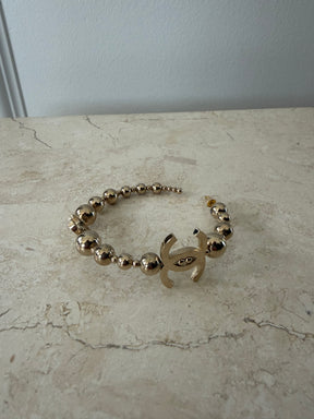 Chanel Gold Tone Ball Logo Hoops
