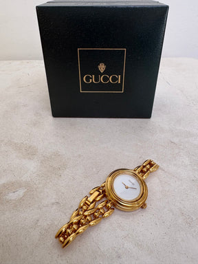 Gucci Gold Tone Interchangeable Bezel Watch