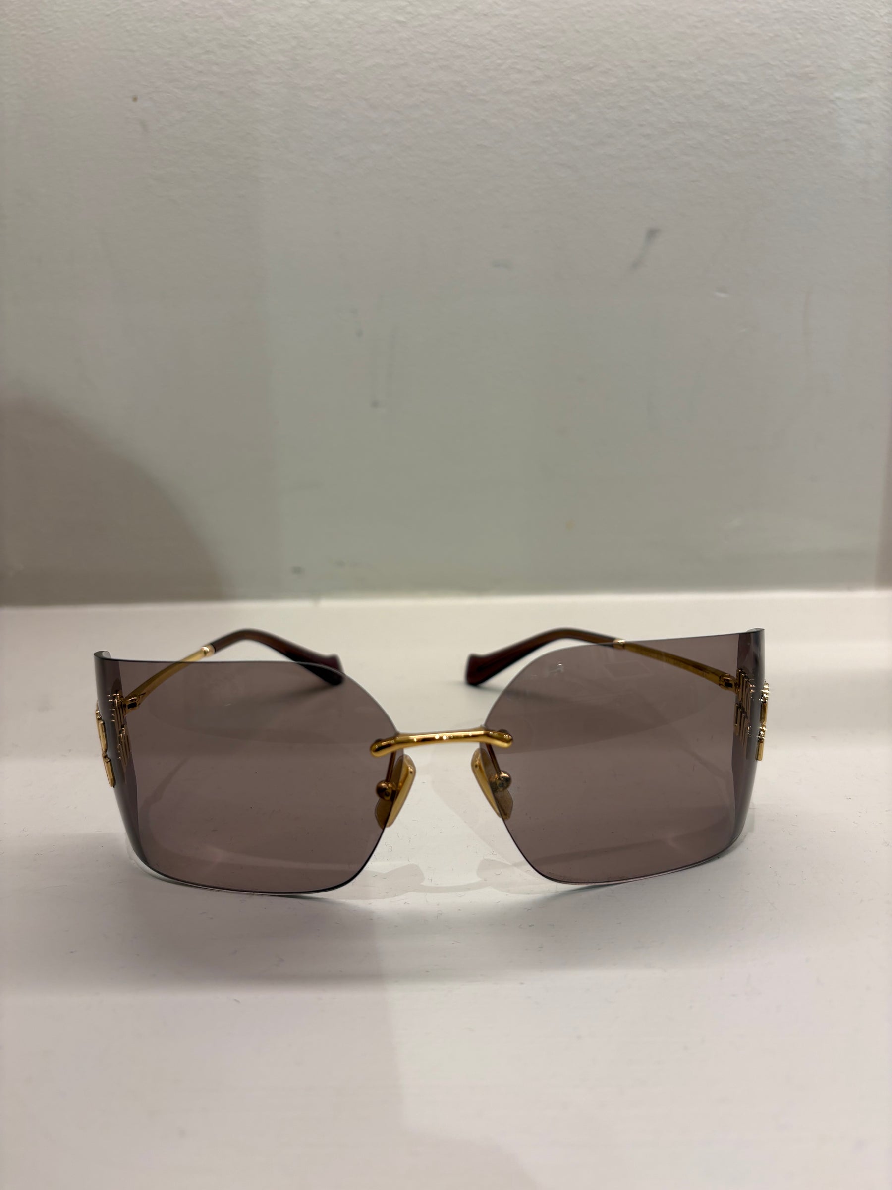 Miu Miu Wrap Around Sunglasses