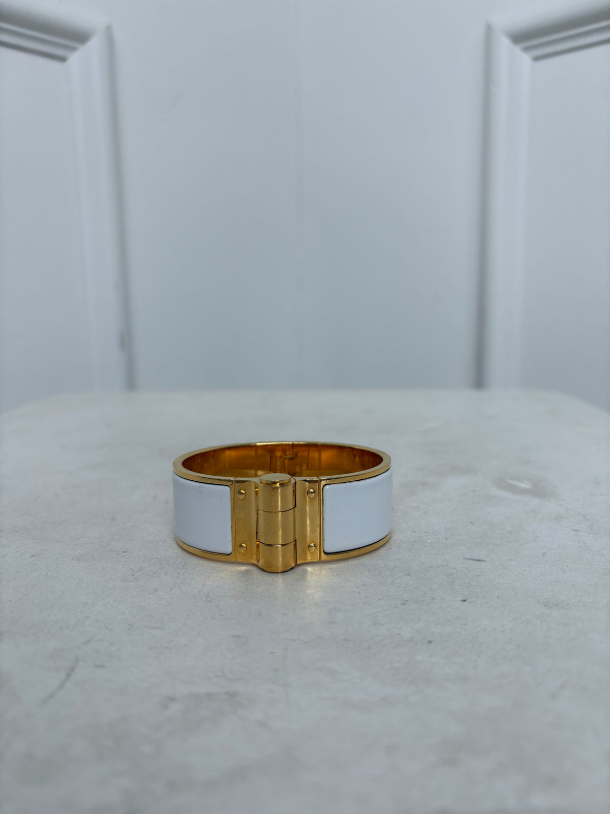 Hermès Gold Tone and White Enamel Bangle