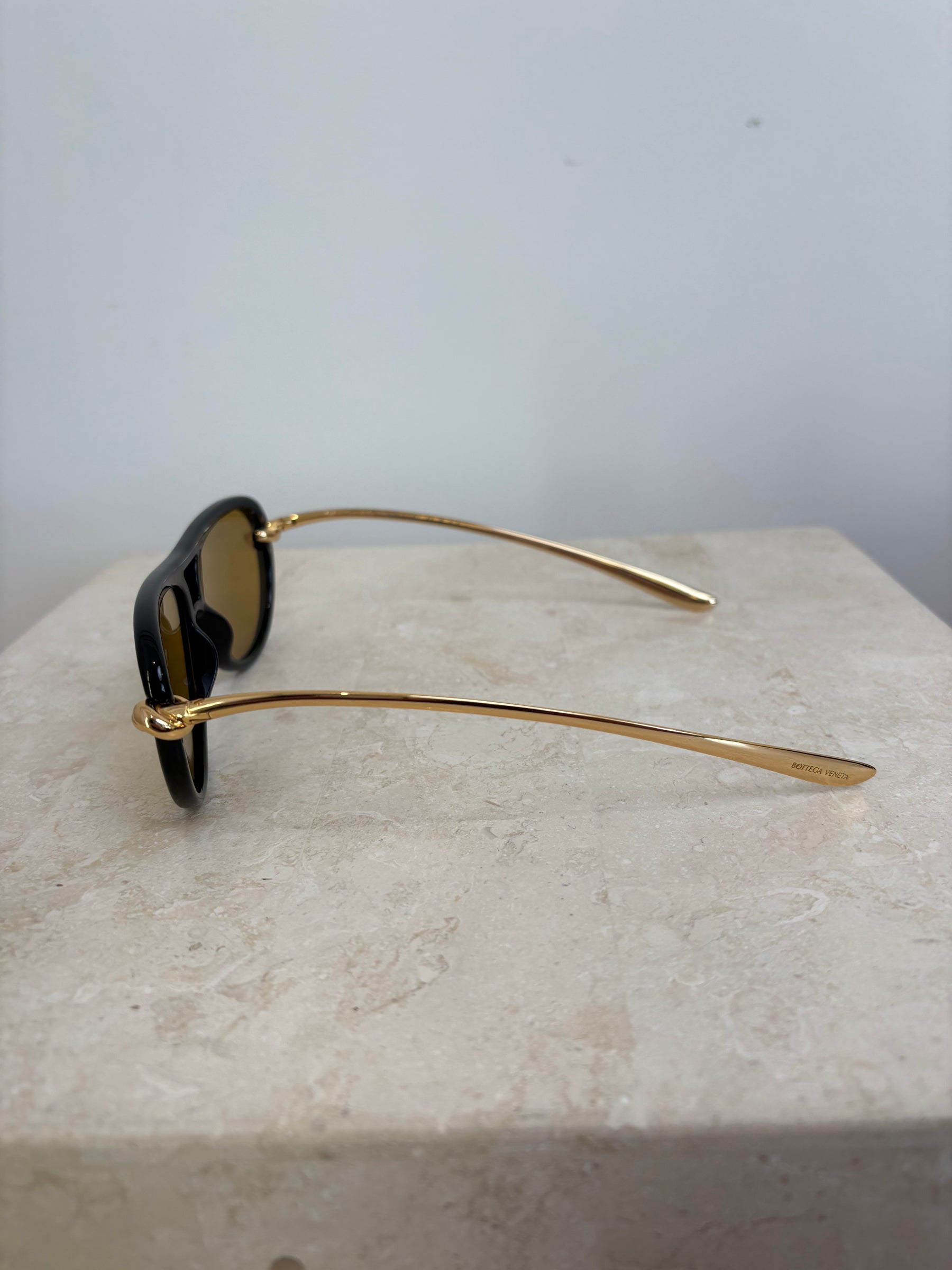Bottega Veneta Black Frame Yellow Lens Knot Arm Sunglasses