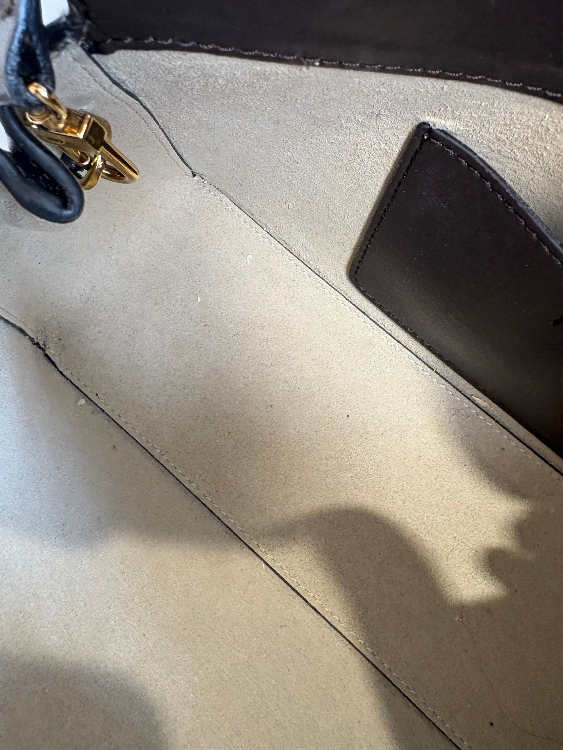 Totême Brown T-Lock Small leather clutch